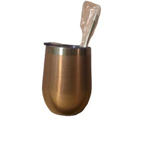 Rose gold insulated wine tumbler for hot/cold drinks.